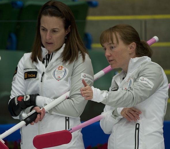 Heather Nedohin, left, discusses strategy with vice-skip Amy Nixon during action on Wednesday. (Photo, CCA/Michael Burns)