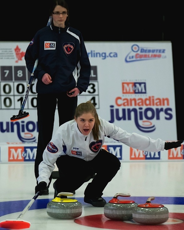B.C. skip Kalia Van Osch, front, calls instructions to sweepers as Nova Scotia skip Mary Fay looks on during the women's semifinal on Saturday. (Photo, CCA/Mark O'Neill/Michael Burns Photography)