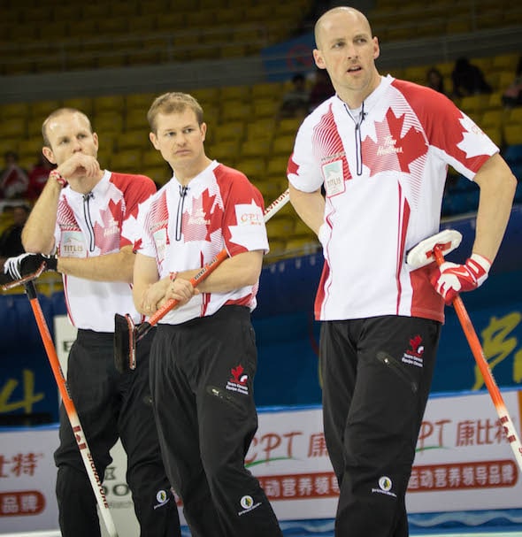 Nolan Thiessen, right, isn't just a great lead. He's also a great planner, who has the major responsibility of keeping Team Canada's books in order, as well as making sure second Carter Rycroft, centre, makes it on time for flights. (Photo, World Curling Federation/Richard Gray)