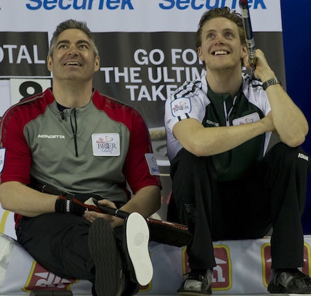 Northwest Territories vice Mark Whitehead, left, and P.E.I. skip Adam Casey have a laugh together on Thursday. (Photo, Curling Canada/Michael Burns)