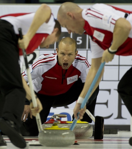 Team Canada vice-skip Pat Simmons shouts instructions to Carter Rycroft, left, and Nolan Thiessen. (Photo, Curling Canada/Michael Burns)