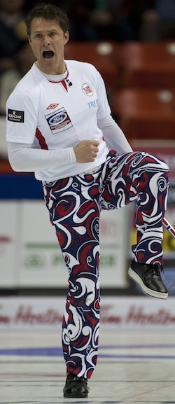 Norway's Thomas Ulsrud tries to coax his rock into the right position. (Photo, Curling Canada/Michael Burns)