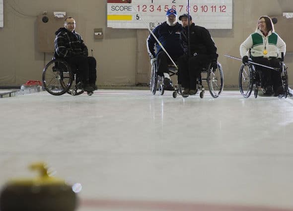 Members of Team Saskatchewan, from left, Darwin Bender, Larry Schrader, Gil Dash and Marie Wright, practise at the Callie Club.