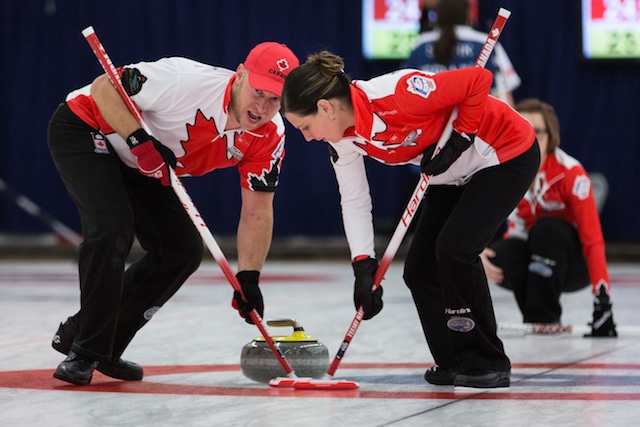 Chris and Teejay Haichert in action at the World Mixed Curling Championship in Berne, Switzerland (Photo WCF/Céline Stucki)
