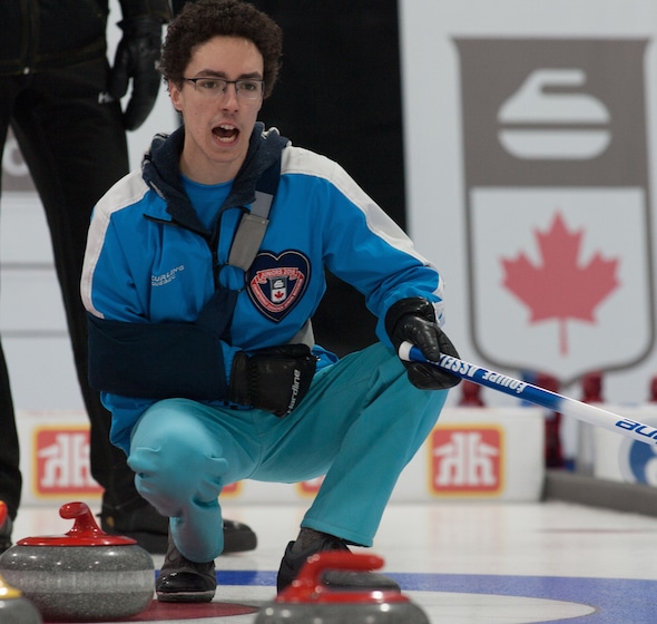 Quebec skip Félix Asselin wore a shoulder sling during his team's win over New Brunswick on Thursday. (Photo, Curling Canada/Bob Wilson)