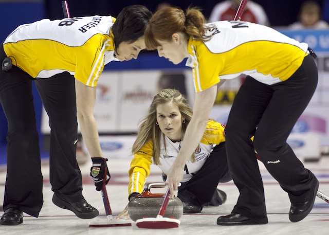 Team Manitoba, Skip Jennifer Jones, throws and second Jill Officer, lead Dawn Askin in a semeifinal win at The 2013 Scotties Tournament of Hearts, February 16-24, Kingston Onatrio, The Canadian Womans Curling Championship.
