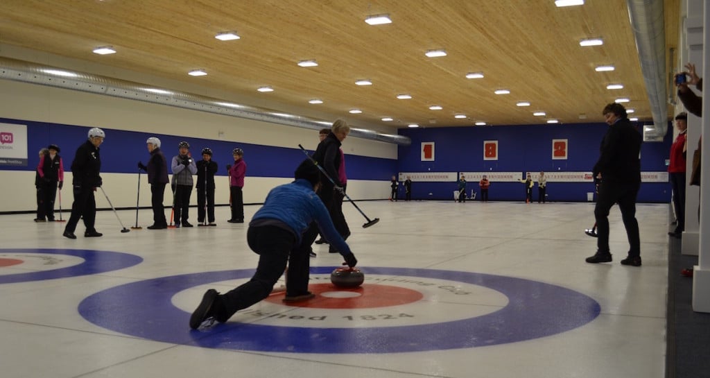 The first rock is thrown to mark the return to curling at the repaired Halifax Curling Club (Photo by Jordan Whitehouse)