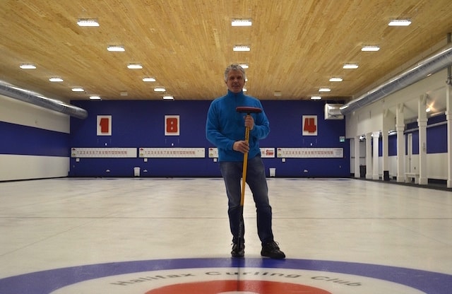 Halifax Curling Club president Grahame Usher stands on the ice of the newly refurbished club (Photo by Jordan Whitehouse)