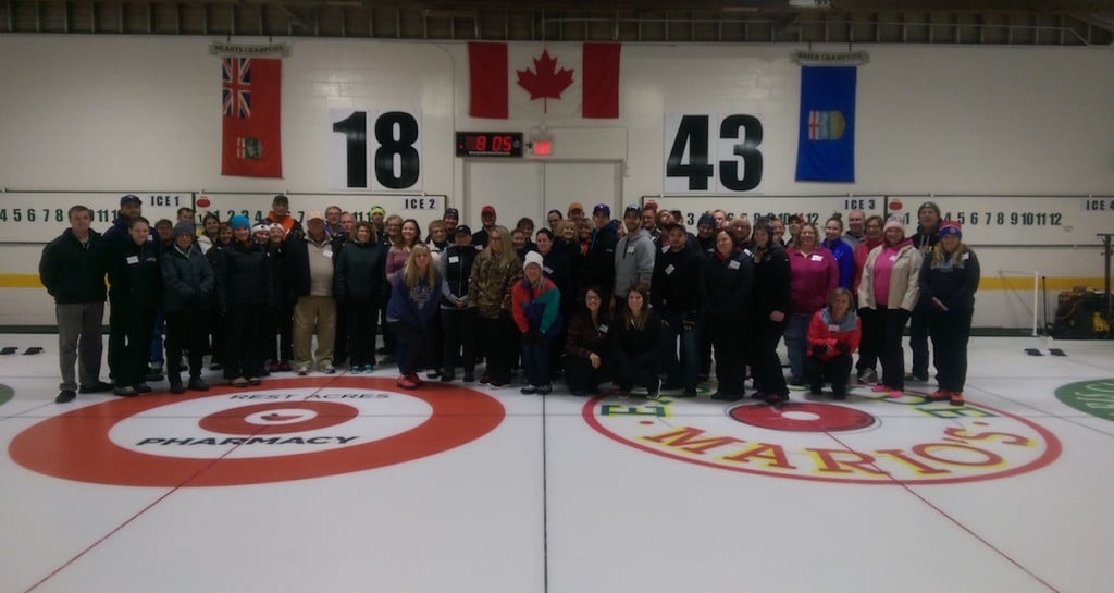 Participants in the Paris Curling Club’s 2015-2016 Adult Learn To Curl program gather on the ice (Photo courtesy of Mark Stouffer)