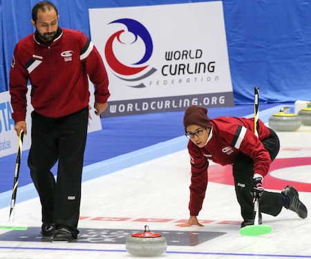 Qatar's Yazid Alyafei, left, and Maryam Binali play in their country's world curling debut on Sunday. (Photo, World Curling Federation/Richard Gray)