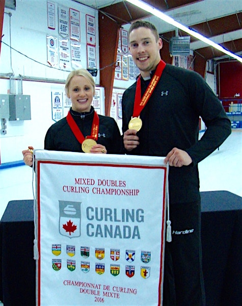 Jocelyn Peterman and Brett Gallant show off their gold medals after the presentation to the 2016 Canadian Mixed Doubles champions at the Nutana Curling Club in Saskatoon, Sask. (Curling Canada/Darlene Danyliw photo)