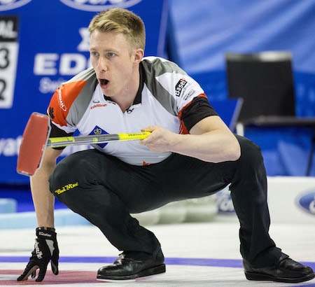 Marc Kennedy calls sweeping instructions to teammates. (Photo, World Curling Federation/Céline Stuckli)