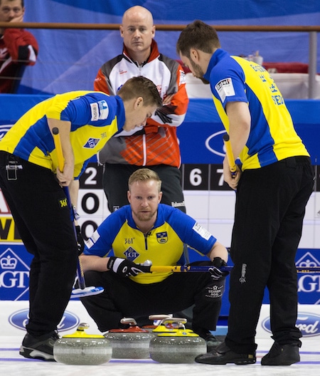 Swedish skip Niklas Edin directs his teammates. (Photo, World Curling Federation/Céline Stuckli)