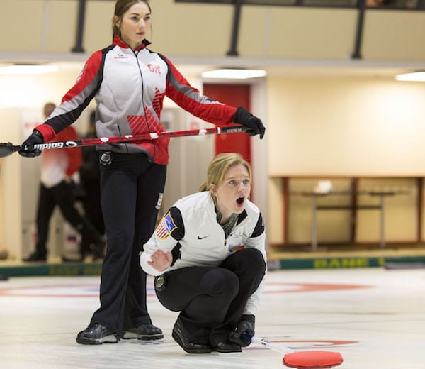 Karlee Burgess watches USA skip Cory Christianson’s shot during the final of the 2016 World Junior Women’s Curling Championship in Taarnby, Denmark (WCF/Marissa Tiel photo)