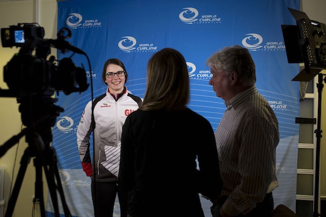 “Through competing and meeting new people, I’ve learned so much,” says Mary Fay, seen here in the media zone at the 2016 World Junior Curling Championships in Taarnby, Denmark (WCF/Marissa Tiel photo)
