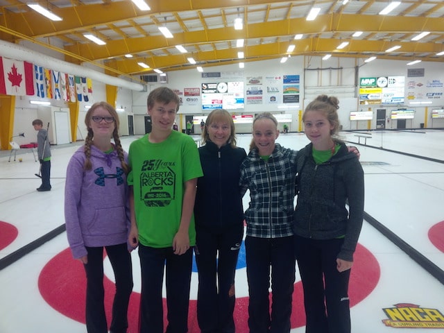 Some campers chillin’ with Canadian Champion and Olympic medalist, Amy Nixon/Photo courtesy of Simon Barrick