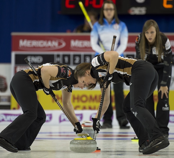 Team Homan (from left, Joanna Courtney, Emma Miskew, Rachel Homan; missing, Lisa Weagle) are looking to cash in this weekend in Portage la Prairie, Man. (Photo, Curling Canada/Michael Burns)