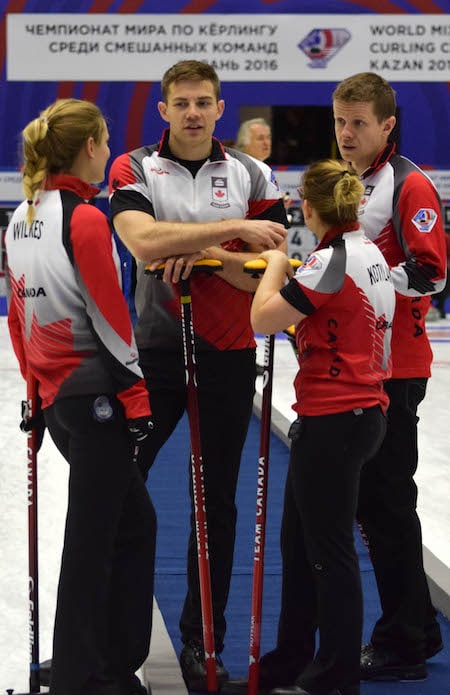 A Team Canada group discussion at the World Mixed Curling Championship. From left, Sarah Wilkes, Brad Thiessen, Alison Kotylak, Mick Lizmore. (Photo, World Curling Federation/Alina Androsova)