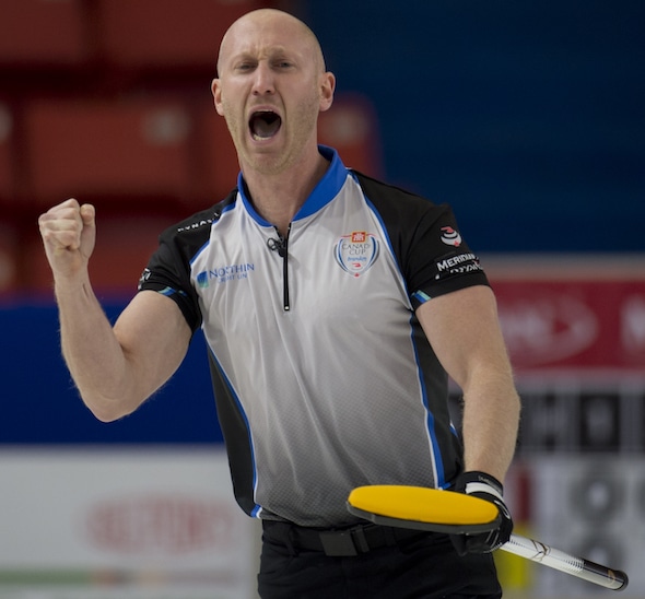 Brad Jacobs celebrates his dramatic game-winning shot against Mike McEwen on Wednesday. (Photo, Curling Canada/Michael Burns)