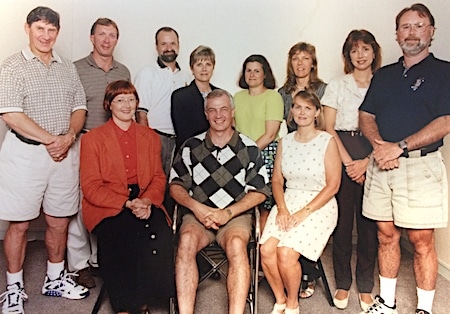 Pat Ray, front, second from left, with the Curling Canada staff back in the day.