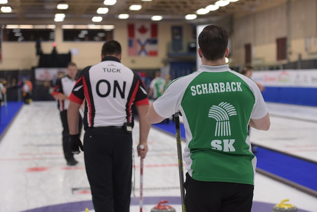 Ontario skip Wayne Tuck and Saskatchewan skip Brady Scharback battle for first place in the final game of the championship round at the 2017 Canadian Mixed Curling Championship in Yarmouth, N.S. (Curling Canada/Clifton Saulnier photo)