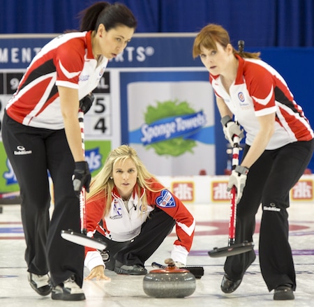 Team Canada Skip Jennifer Jones, Second Jill Officer, Lead Dawn McEwen, in draw seven action at the 2016 Scotties Tournament of Hearts, the Canadian Womens Curling Championships, Grande Praire, Alberta