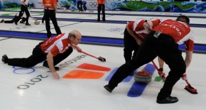 Kevin Martin of Team Canada delivers a rock in his second draw at the 2010 Olympic Winter Games.