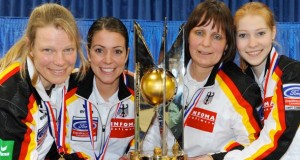 Team Germany with their championship trophy at the 2010 Ford World Women's Curling Championship