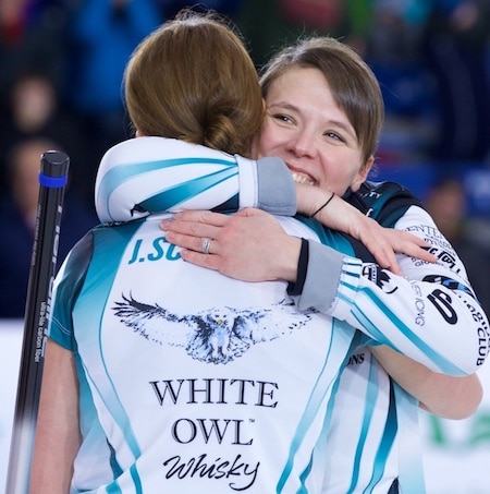 Casey Scheidegger, right, hugs her sister Jesse after their Grand Slam triumph on Sunday. (Photo, Anil Mungal/Rogers Sportsnet)