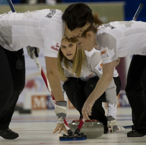 Winnipeg's Jennifer Jones, middle, with teammates Jill Officer, left, Dawn McEwen and Kaitlyn Lawes (not pictures) won the Grand Slam Curlers Corner Autumn Gold on Monday in Calgary. (Photo, CCA/Michael Burns)
