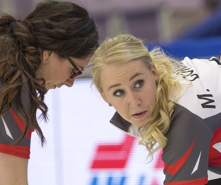 Northwest Territories third Megan Cormier, right, and second Danielle Derry in action during Friday's game. (Photo, Curling Canada/Andrew Klaver)