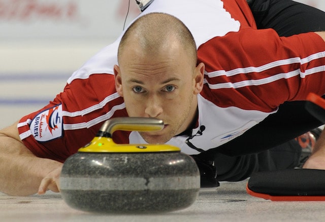 London Ont.Mar7_2011.CCA Tim Hortons Brier.Newfoundland Labrador's third,Ryan Fry delivers his stone in thier morning draw against Saskatchewan.NL defeats Saskatchewan 7-6.michael burns photo