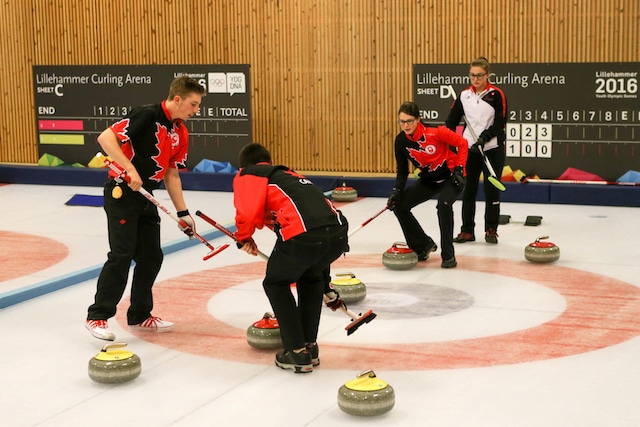 Skip Mary Fay, second Sterling Middleton and vice Tyler Tardi guide a rock into the rings during semifinal action at the 2016 Youth Olympic Games in Lillehammer, Norway (WCF/Richard Gray photo)