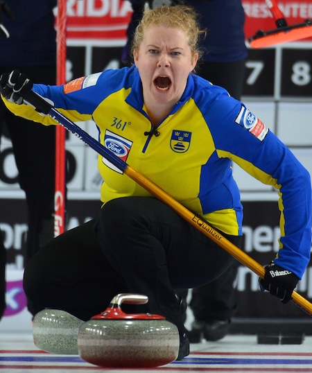 Swedish skip Margaretha Sigfridsson shouts encouragement to her teammates. (Photo, Curling Canada/Michael Burns)